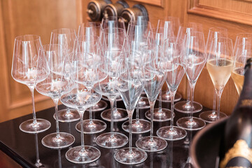 Plenty of empty clean wine glasses on the table during a banquet