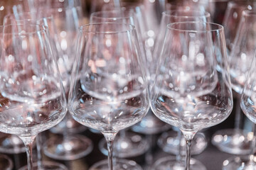 Plenty of empty clean wine glasses on the table during a banquet
