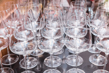 Plenty of empty clean wine glasses on the table during a banquet