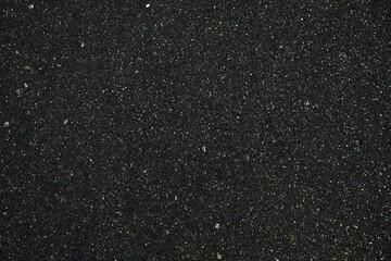 Close up Black Asphalt Texture Background.