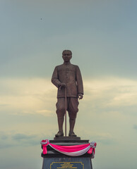 Phatthalung, THAILAND - July 8, 2019: King statue in the beautiful sky at Lampam beach