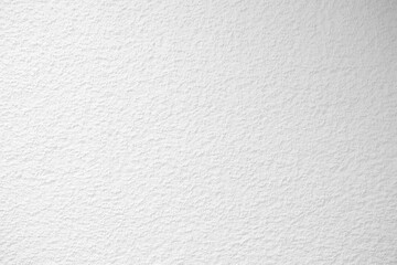 White Stucco Wall Texture Background with Light Beam on the Surface.