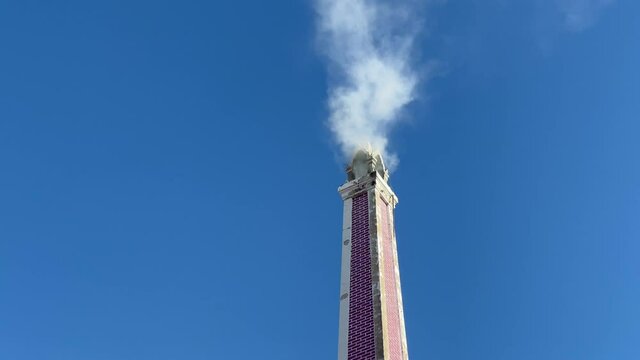 Footage of  Crematoriums in Used for Funeral with Smoke Against Blue Sky