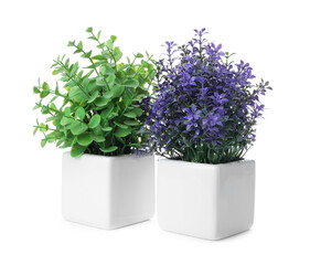 Beautiful artificial plants in flower pots isolated on white