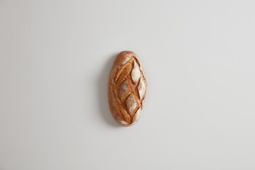 Tasty homemade handmade nourishing peasant bread on white background. Bakery and food concept. Flat...