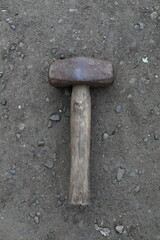 Old Hammer on Dirt Ground Closeup