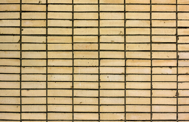 brick wall painted yellow texture