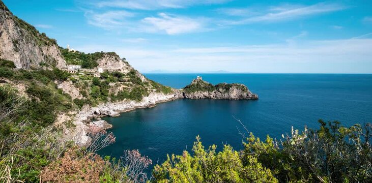 Promontory and tower of Capo di Conca in the municipality of Conca dei Marini (time lapse). Coastal tower on the mediterranean sea. Amalfi Coast, Salerno, Campania, Italy