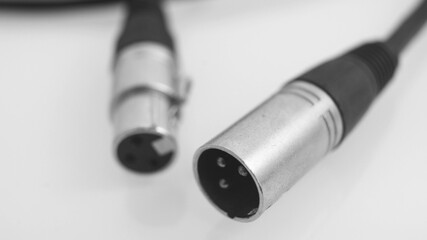 Close up shot of a male and female XLR plug connectors - audio cable