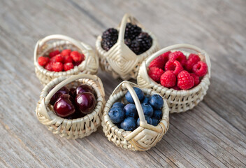 Ripe berries in small baskets