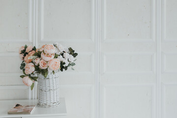 Beautiful peonies bouquet in minimalist indoor setting.Cozy interior