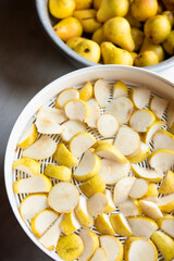 Homemade drying dehydration process of pears close-up