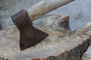 Axe in the stump, woodworking tools, chopping wood
