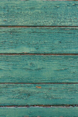 Aged green painted wood wall