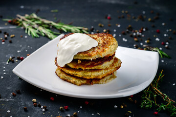 potato pancake with sour cream