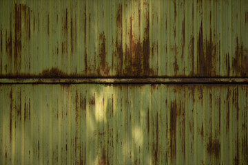 Rusty metal texture. Metal sheet with rust and worn green paint. Old abstract style. Art texture.