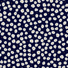 Seamless plant pattern. Small cute flowers of daisy. Trendy floral background for fashion prints, wallpaper, surface. Chaotic order. Country style