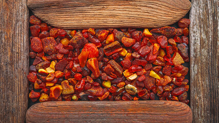 Amber stones framed in a wooden frame