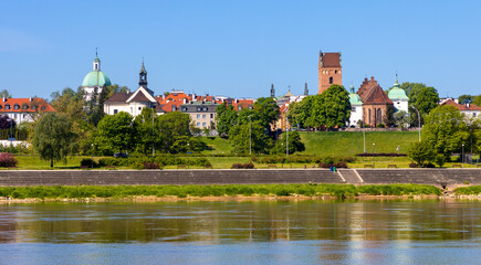 Panoramic view of New Town quarter - Nowe Miasto - and Muranow district with Wybrzerze Gdanskie embankment at Vistula river in Warsaw, Poland