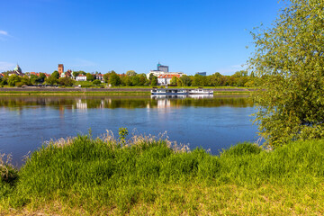 Panoramic view of New Town quarter - Nowe Miasto - and Muranow district with Wybrzerze Gdanskie and wild banks of Vistula river in Warsaw, Poland - obrazy, fototapety, plakaty