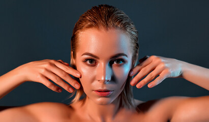 Girl with perfect skin on a gray background.