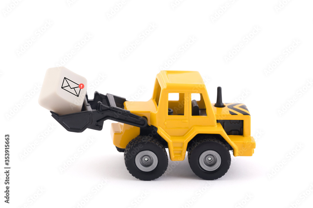 Poster bulldozer with new email graphic on computer key isolated on white background with clipping path
