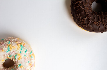 Dark and light donuts on a white background