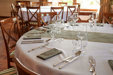 Wedding tables ready to be decorated for the ceremony