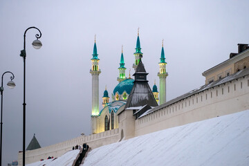 Kazan, cityscape. Wall and towers of the Kazan Kremlin and Kul Sharif Mosque on a cloudy winter...
