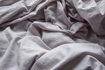 background from crumpled gray blankets. linens. sitting at home. recreation. morning 