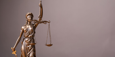 Legal and law concept statue of Lady Justice with scales of justice