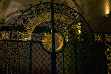 Gate of a tower of Sjujumbeke in the Kazan Kremlin. The stylized images of the moon and the sun