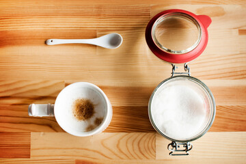 Cup of coffee on a wooden table in the office