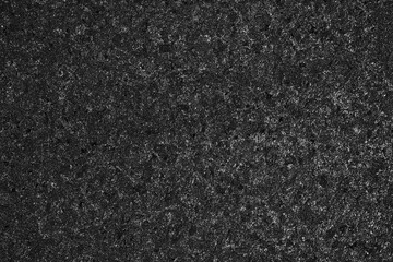 Abstract Black Rough Sand Wall Texture Background, Suitable for Product Presentation, Mockup, and Backdrop.