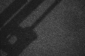 Fototapeta premium Pole shadow on Asphalt Road Background in Dark Composition.