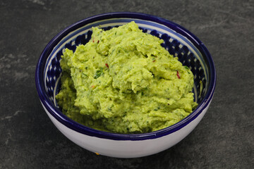 Avocado guacamole sauce with chili pepper