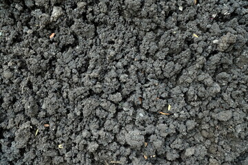 Black Fertilizer Soil Texture Background.