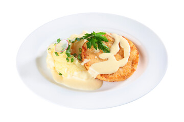 Breaded chicken cutlet with mashed potatoes on a white plate. An isolated object.Top view.