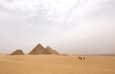 The pyramids of Giza, Menkaure, Khafre, and Khufu