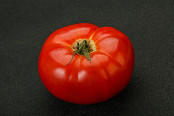 Ripe big juicy red tomato