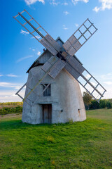 Old style windmill under blue sky, Sweden