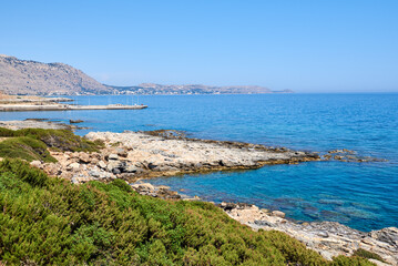 Rocky coast with transparent water near Glistra and Ladros beach on the island of Rhodes