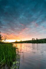 Naklejka na ściany i meble beautiful sunset on the Narew River