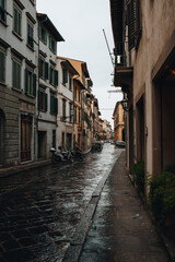 Fototapeta na wymiar rainy florence street medieval