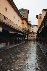 Fototapeta na wymiar rainy florence street medieval old 