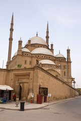 CAIRO, EGYPT, APRIL 21: A guide waits for the tourists at the entrance gate of the Mohamed Ali Alabaster Mosque in Citadel of Cairo, Egypt on April 21, 2018