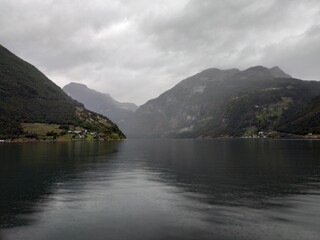 View on Geiranger fjord, rocks and the valley at cloudy weather.