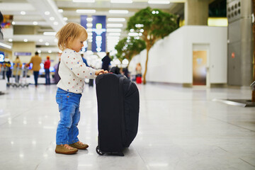 Adorable little girl in the airport