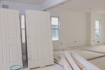 A new home interior wooden stacker doors a wait installation