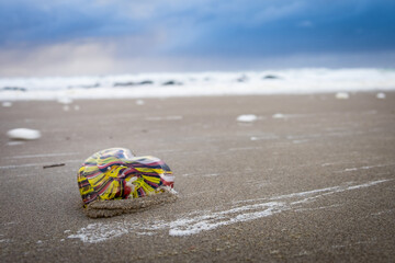 Glass Hart in the Sand on the Beach